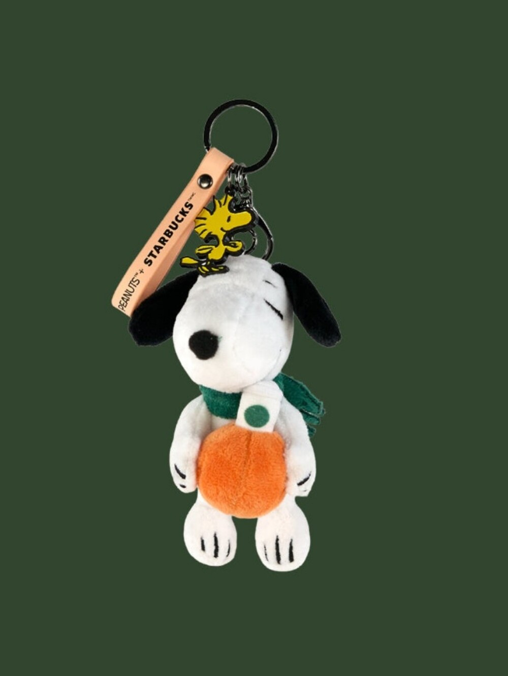Peanuts Snoopy Plush Keychain by Peanuts in White, Black, Orange & Green